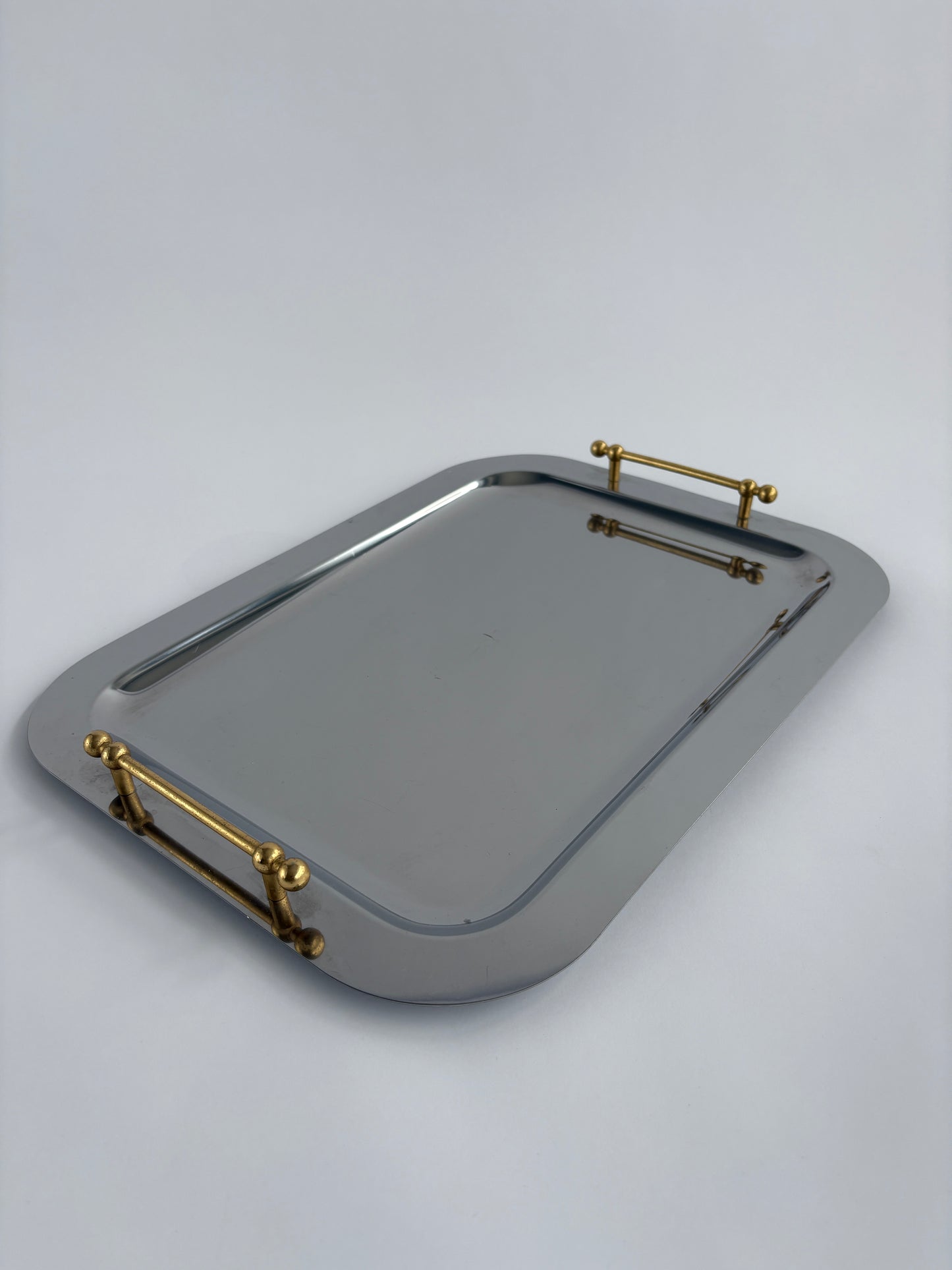 Large silver serving tray with gold handles