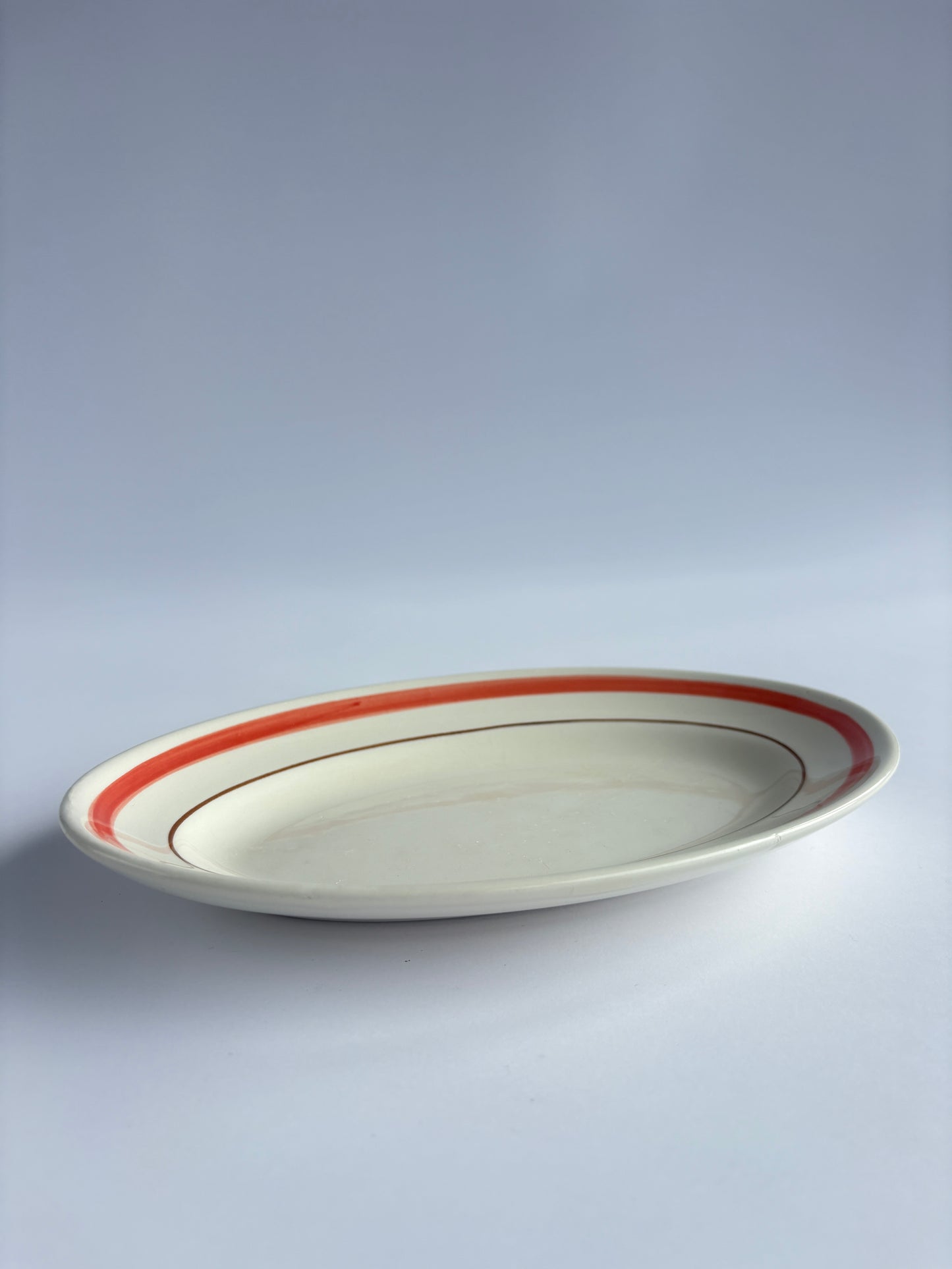 Small serving plate (ravier) with red rim
