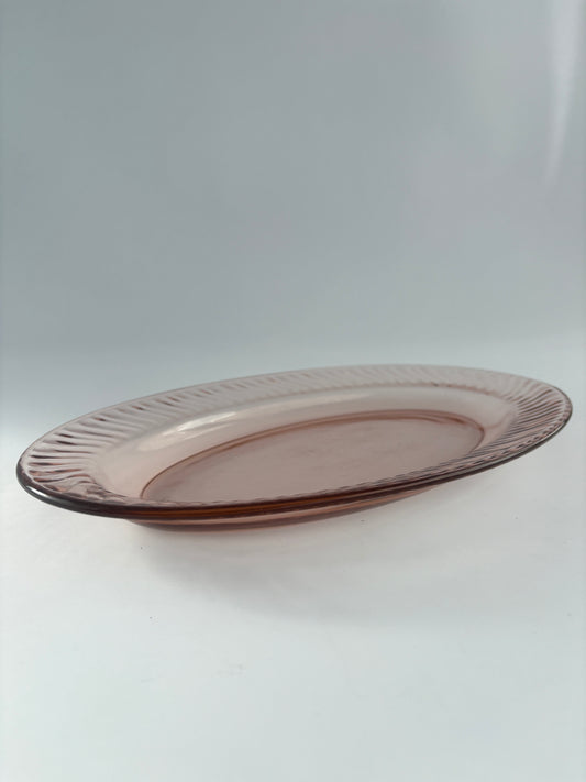 Set of two oval serving dishes, pink ribbed glass