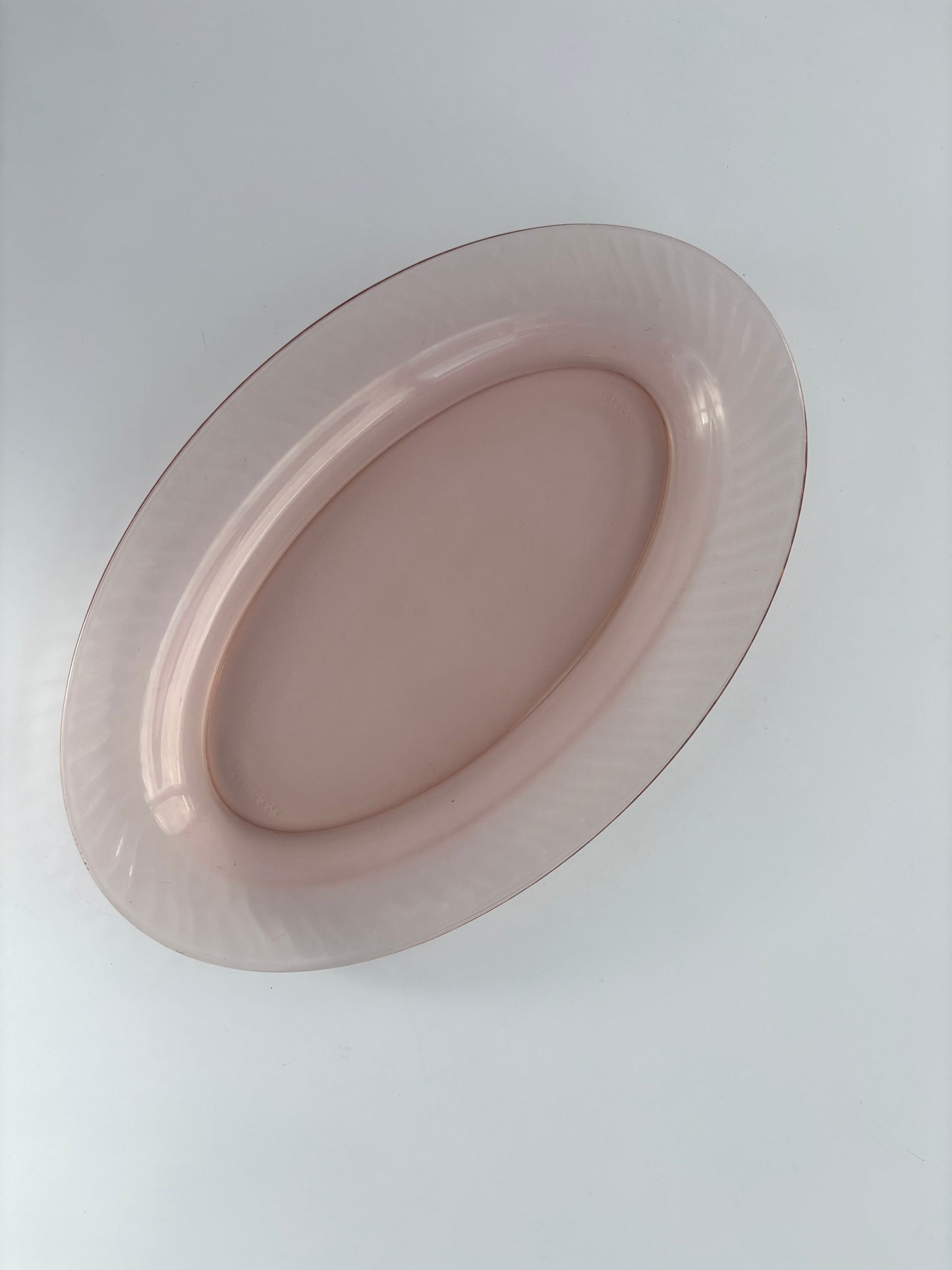 Set of two oval serving dishes, pink ribbed glass