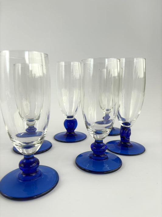 Set of 6 champagne glasses with dark blue stems