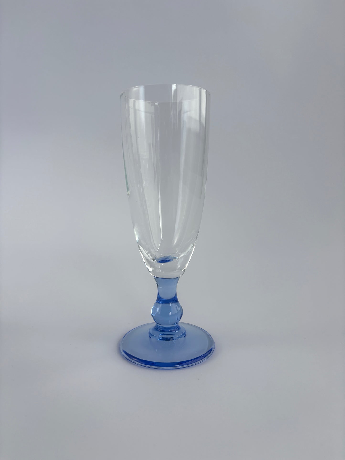Set of 5 champagne glasses with blue stems