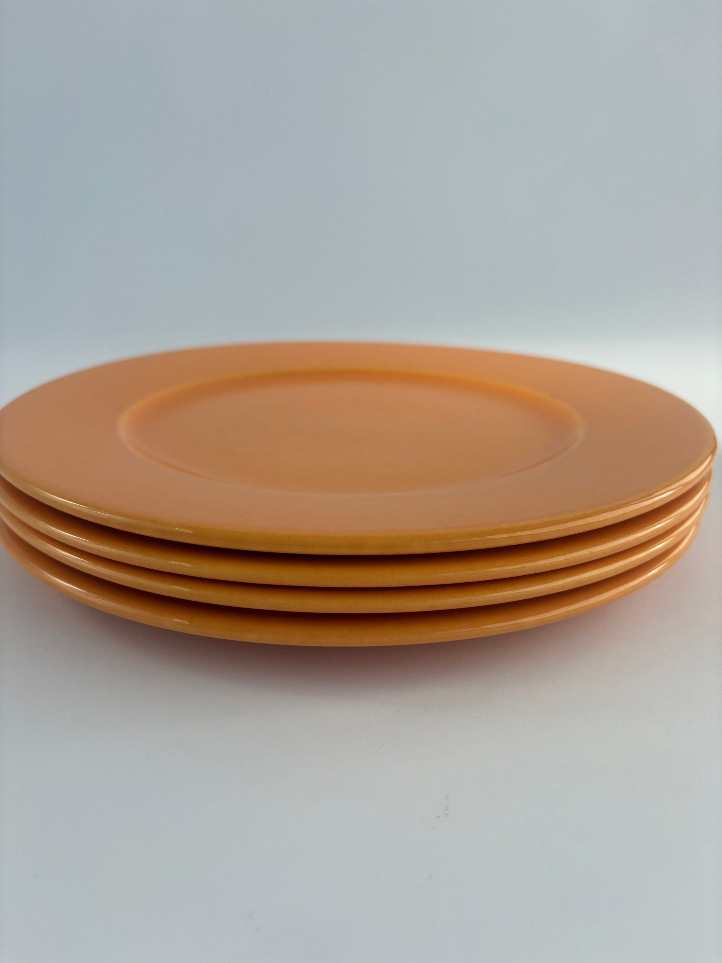 Set of 4 large orange plates