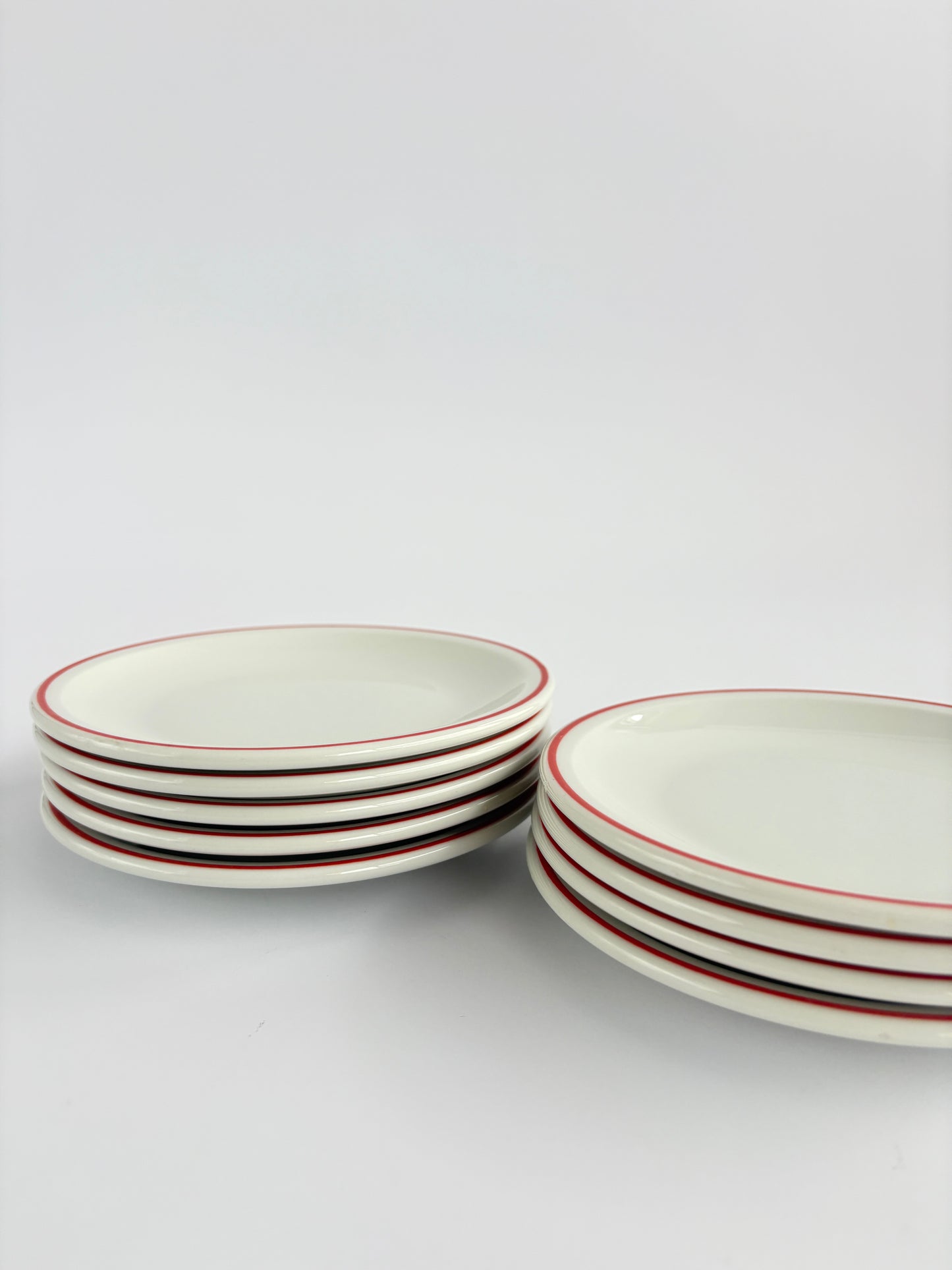 Set of 9 white snack plates with red rim