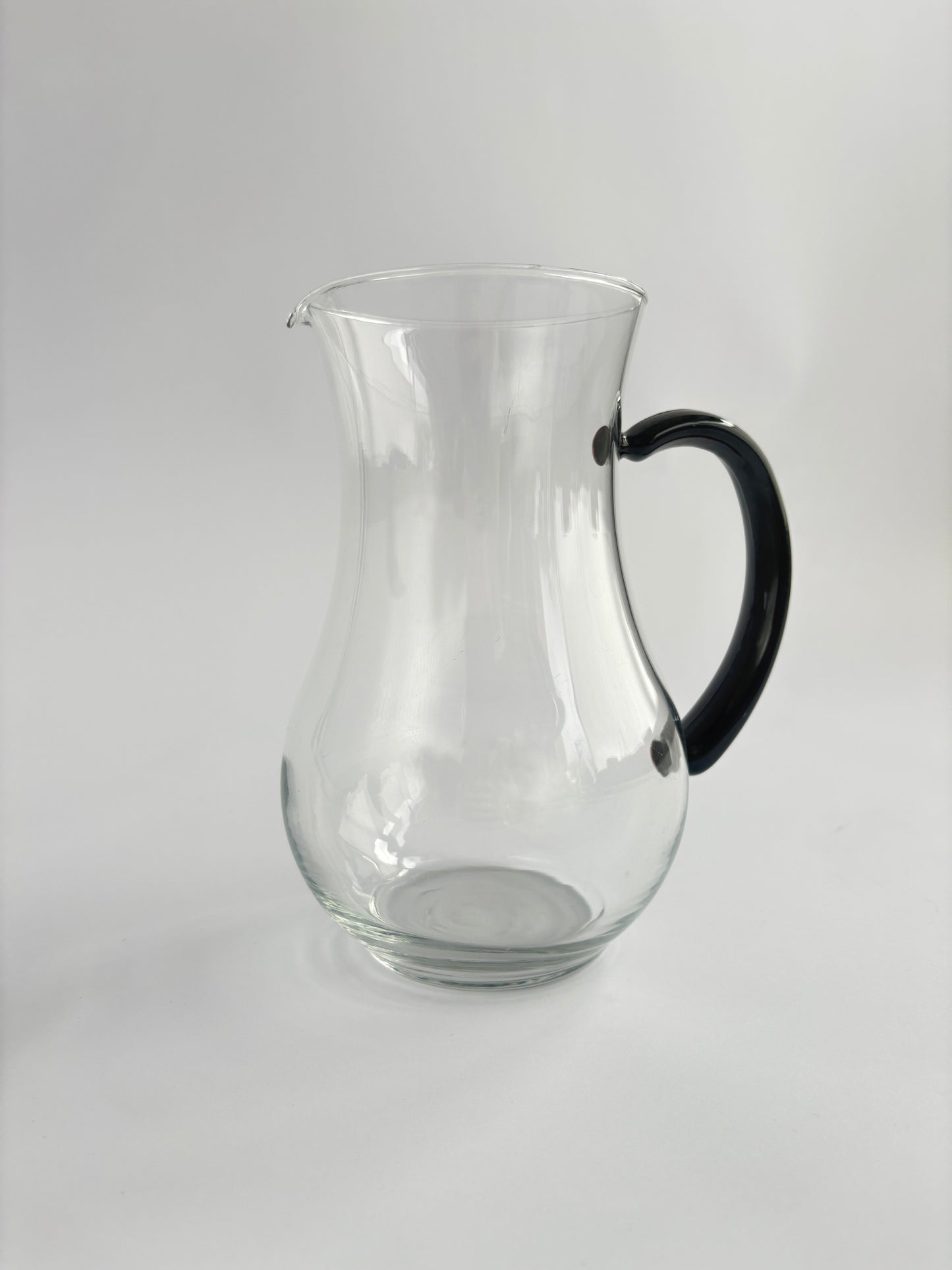 Carafe with black handle
