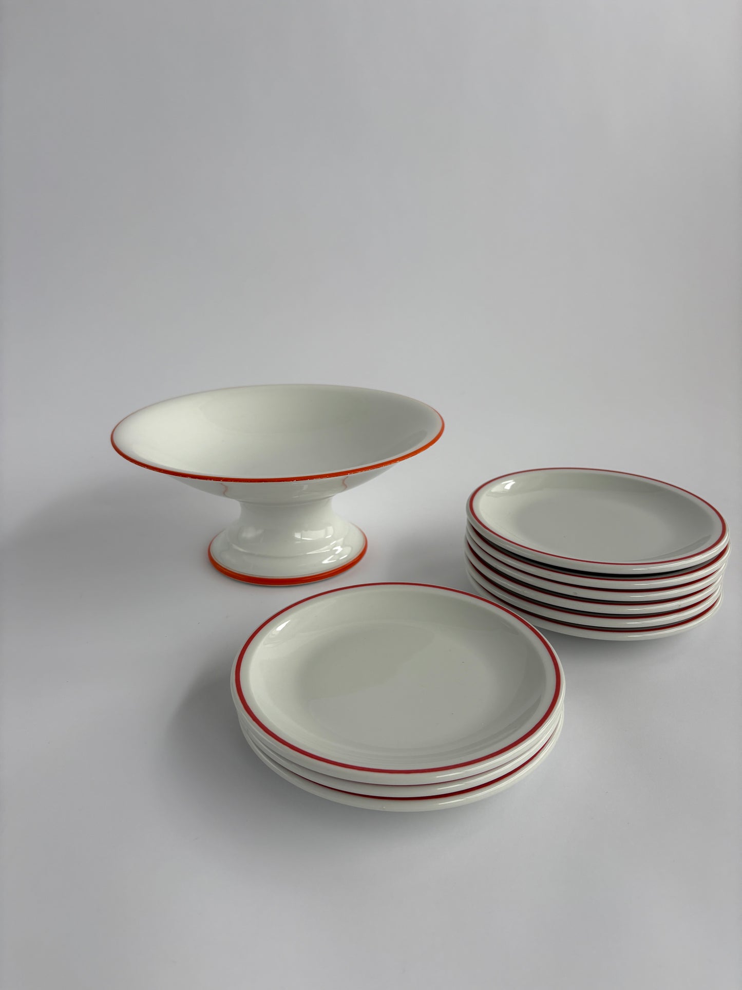 Set of 9 dessert plates with pedestal serving bowl