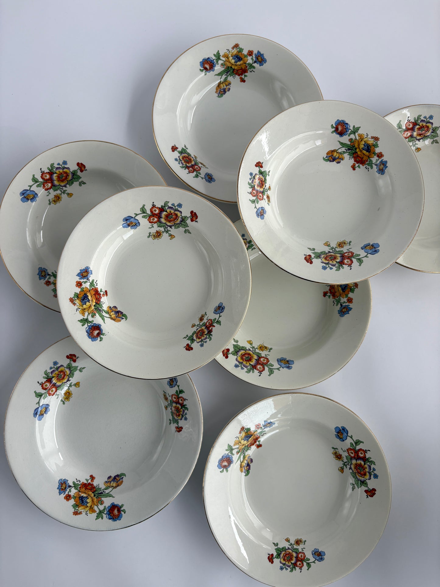 Set of 8 deep plates