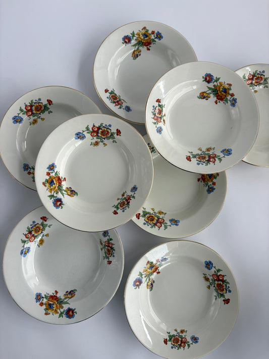 Set of 8 deep plates