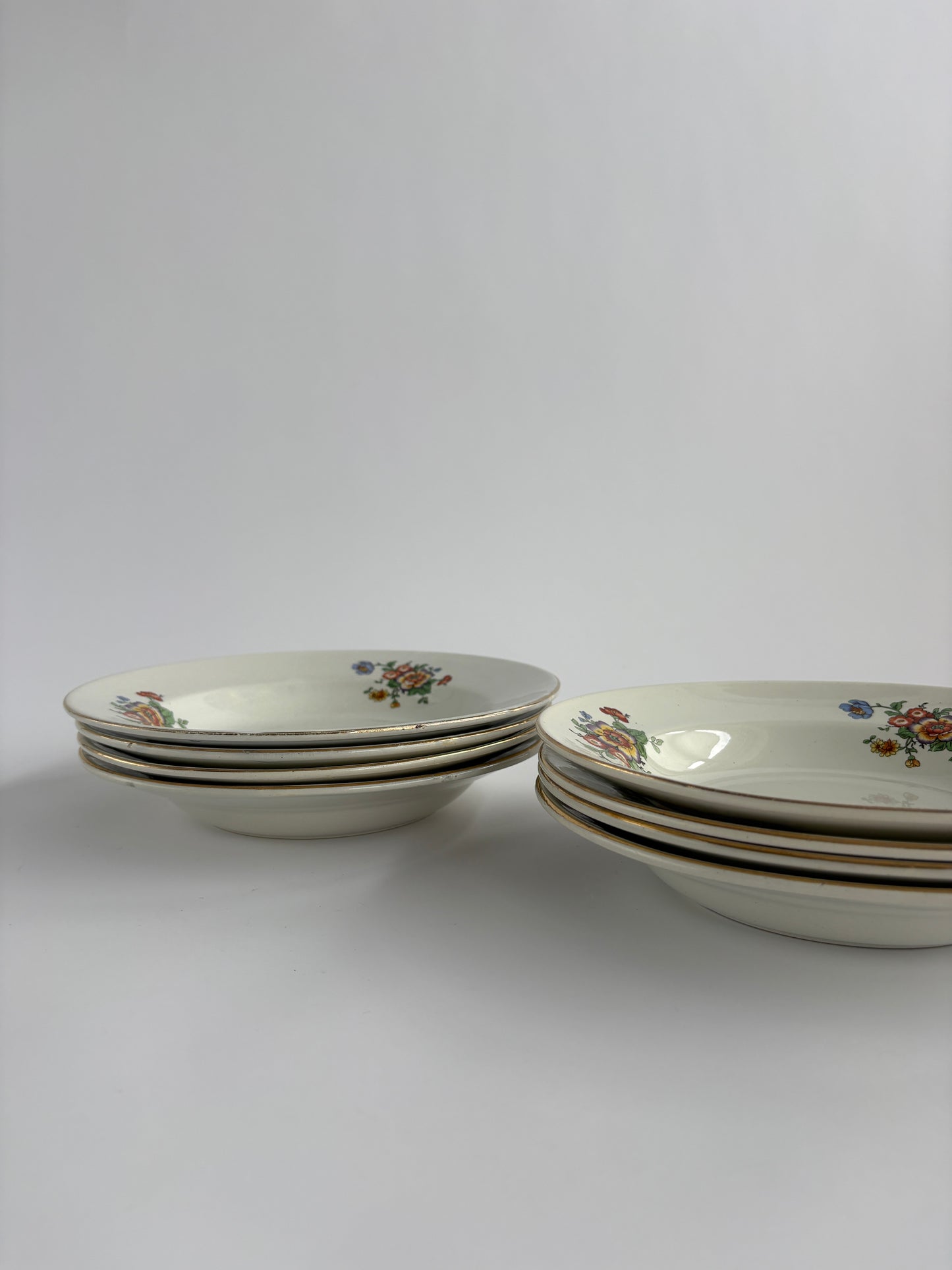 Set of 8 deep plates