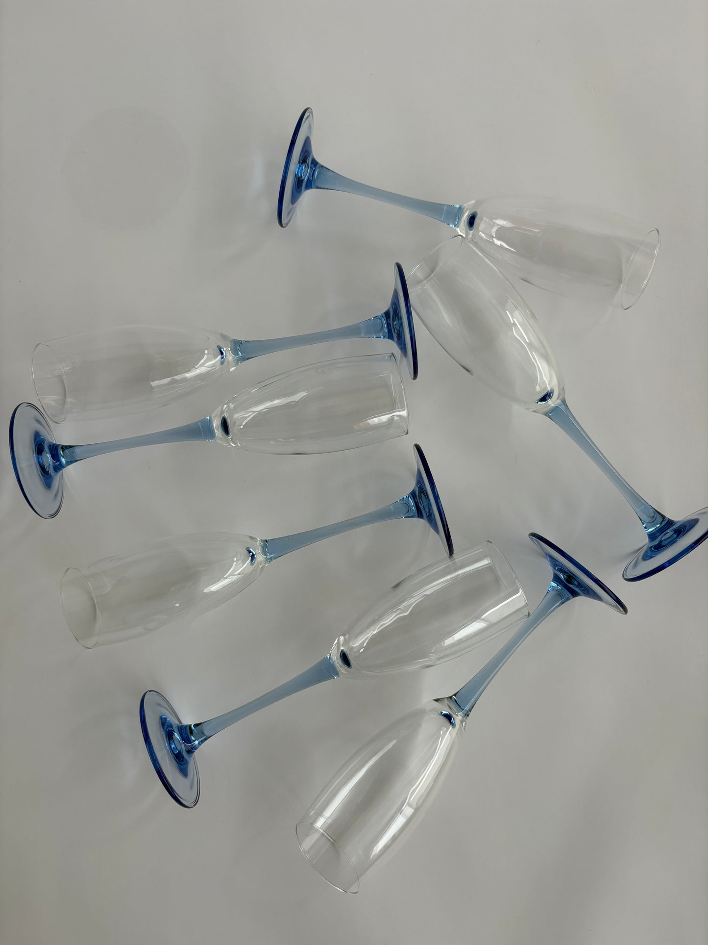 Set of 7 champagne glasses with blue stem