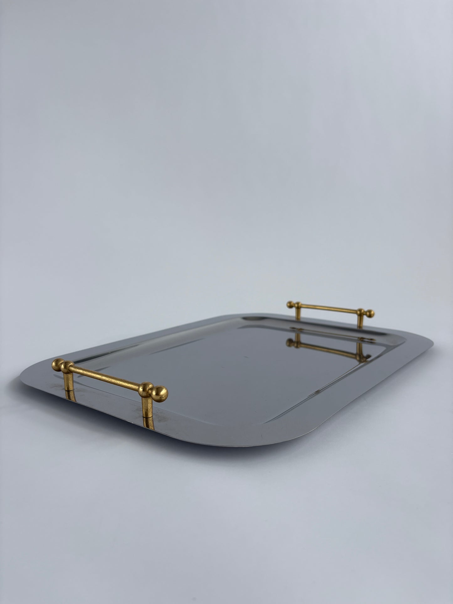 Large silver serving tray with gold handles