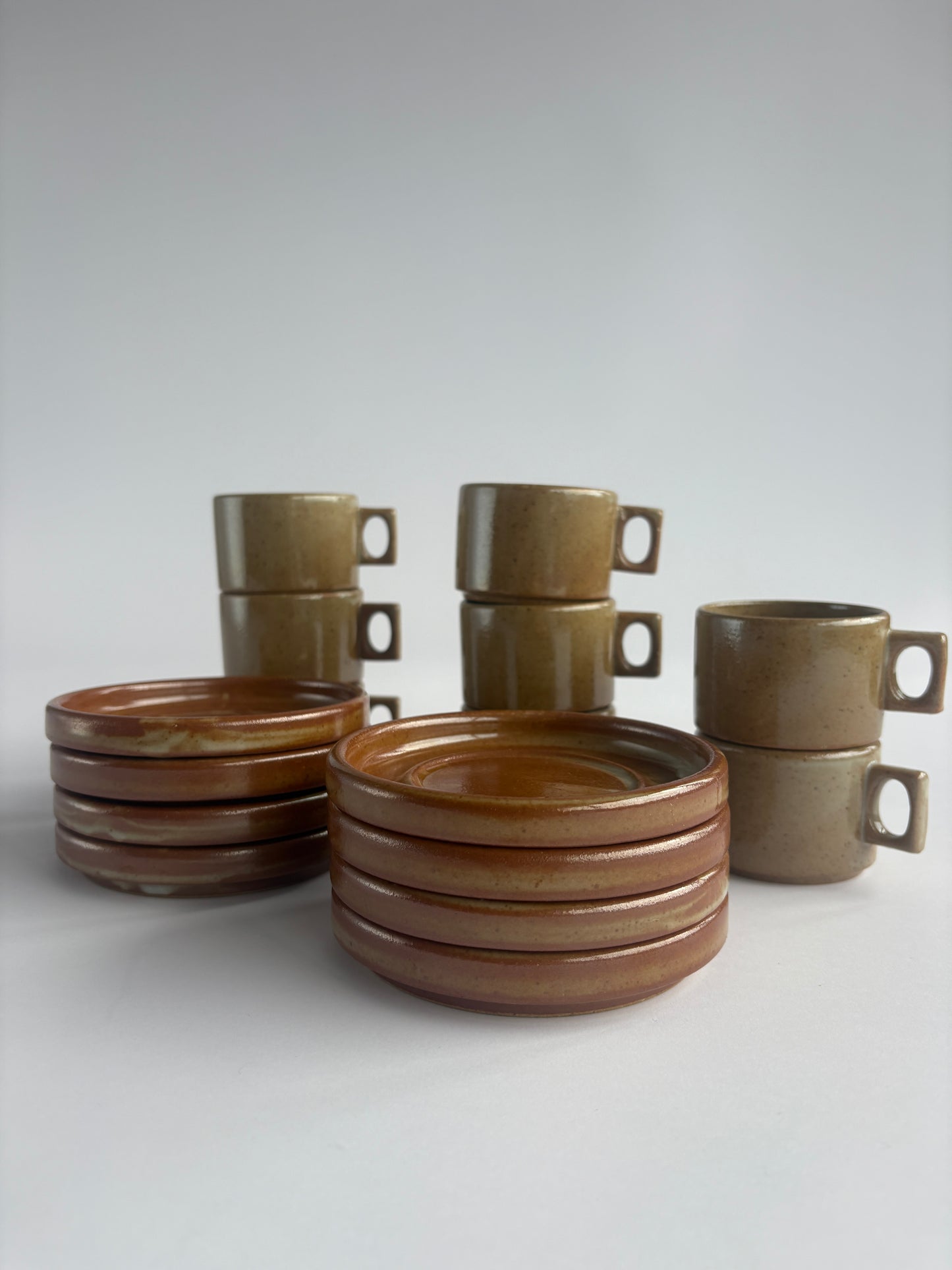 Set of 8 earthy stoneware cups with matching plates