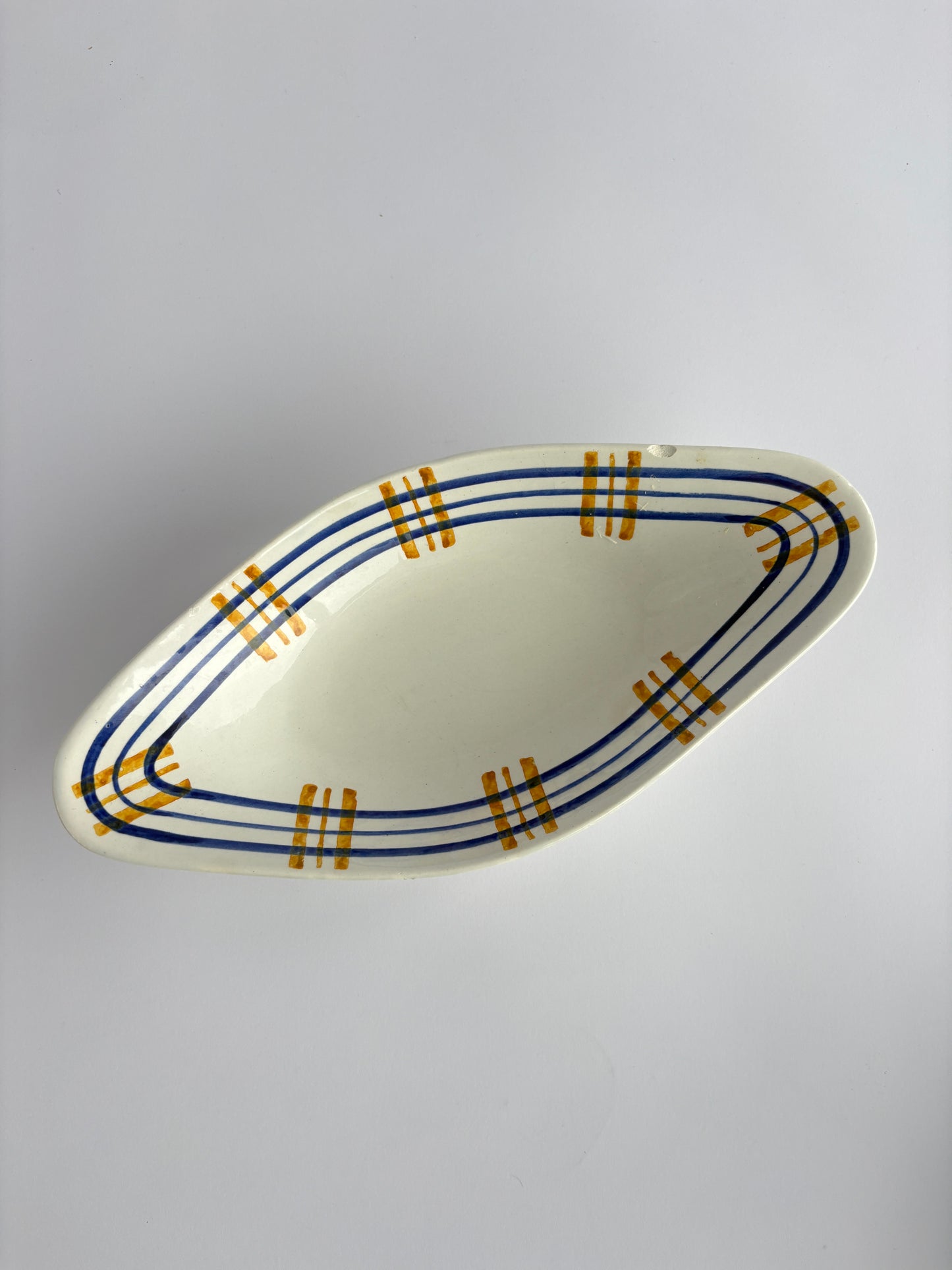 Small serving dish with blue & yellow stripes
