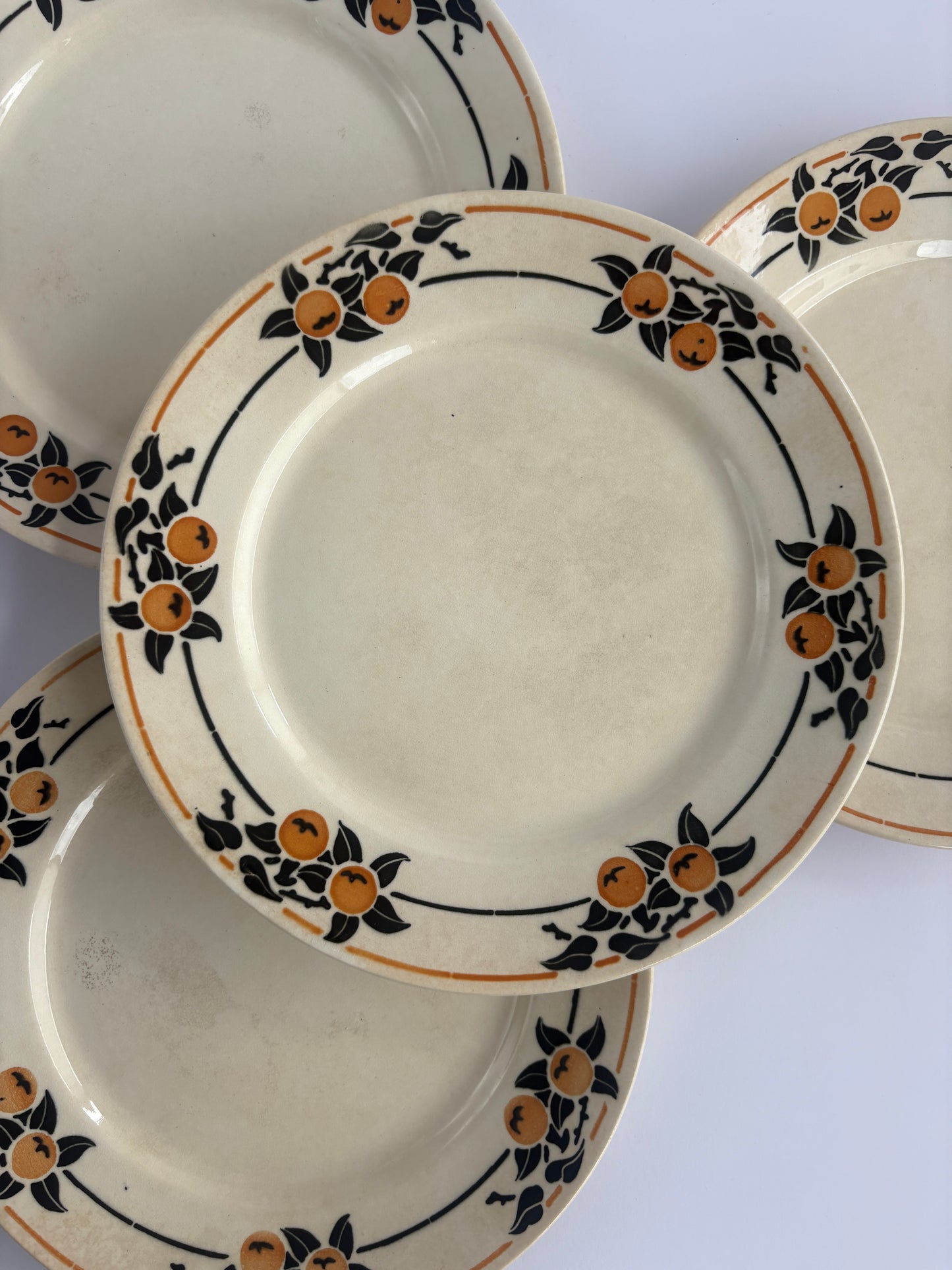 Set of 4 Badonviller Madeleine plates with orange motif