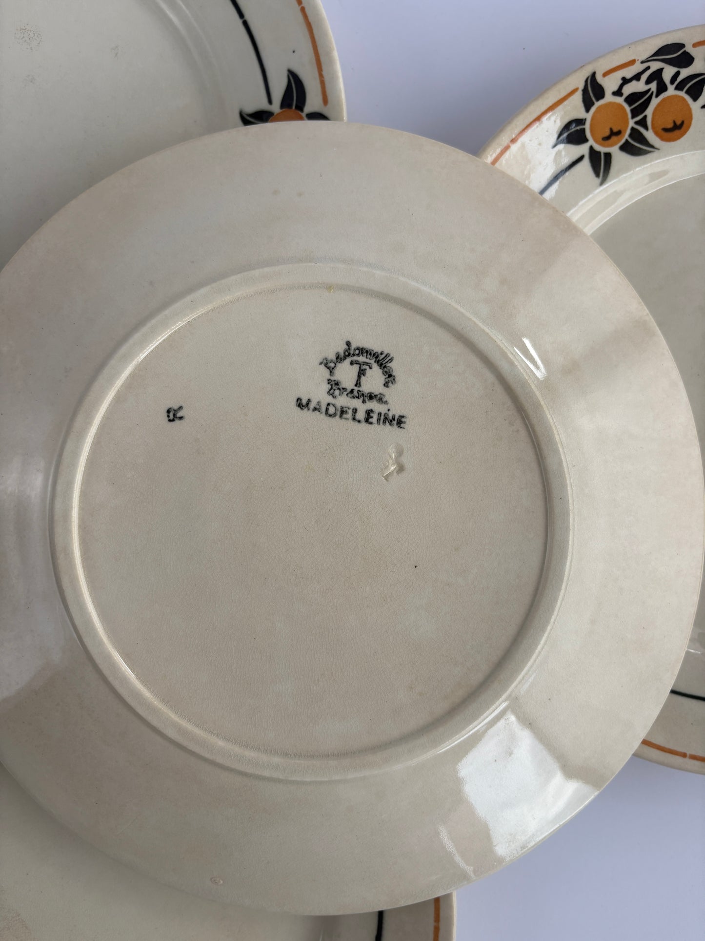 Set of 4 Badonviller Madeleine plates with orange motif