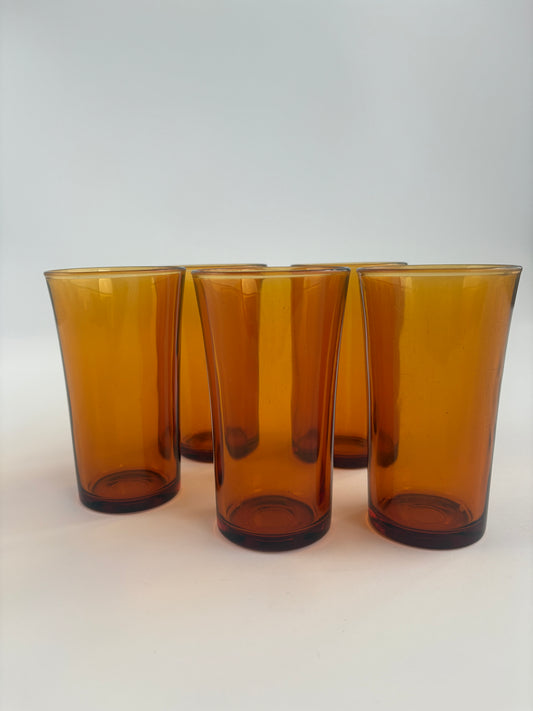 Set of 5 amber-colored long drink glasses
