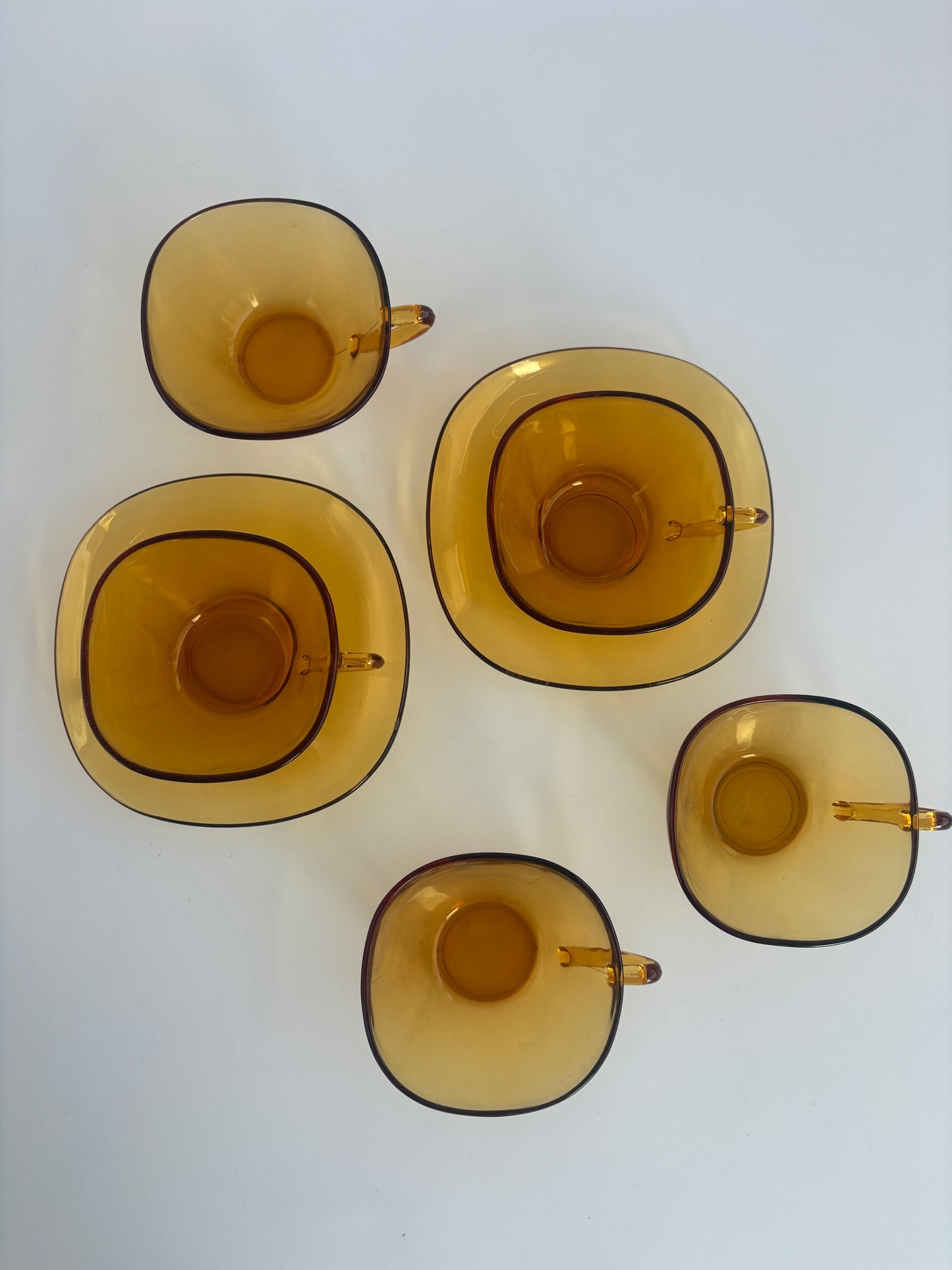 Vintage tea cups in amber
