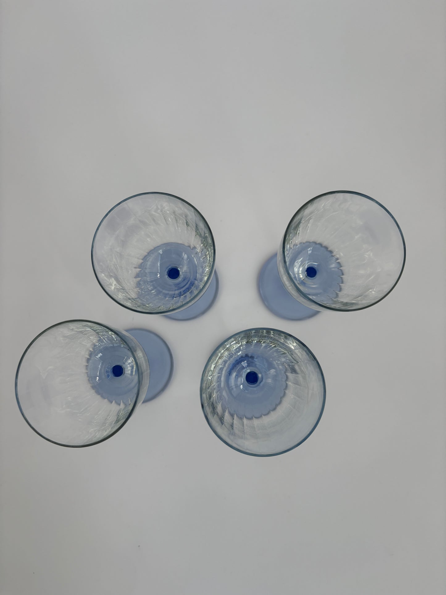 Set of 4 wine glasses with light blue stems