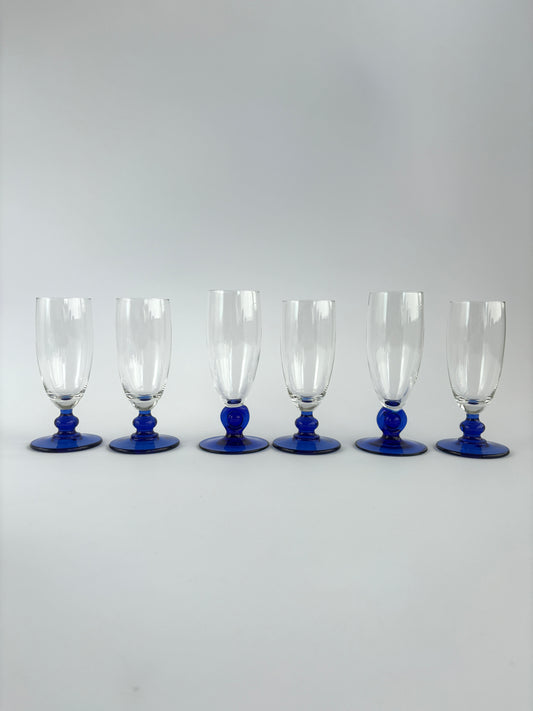 Set of 6 champagne glasses with dark blue stems