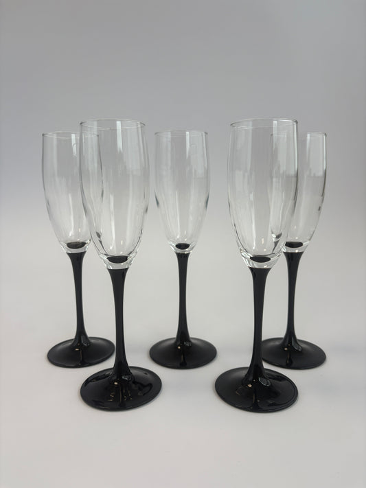 Set of 5 champagne glasses with black stems