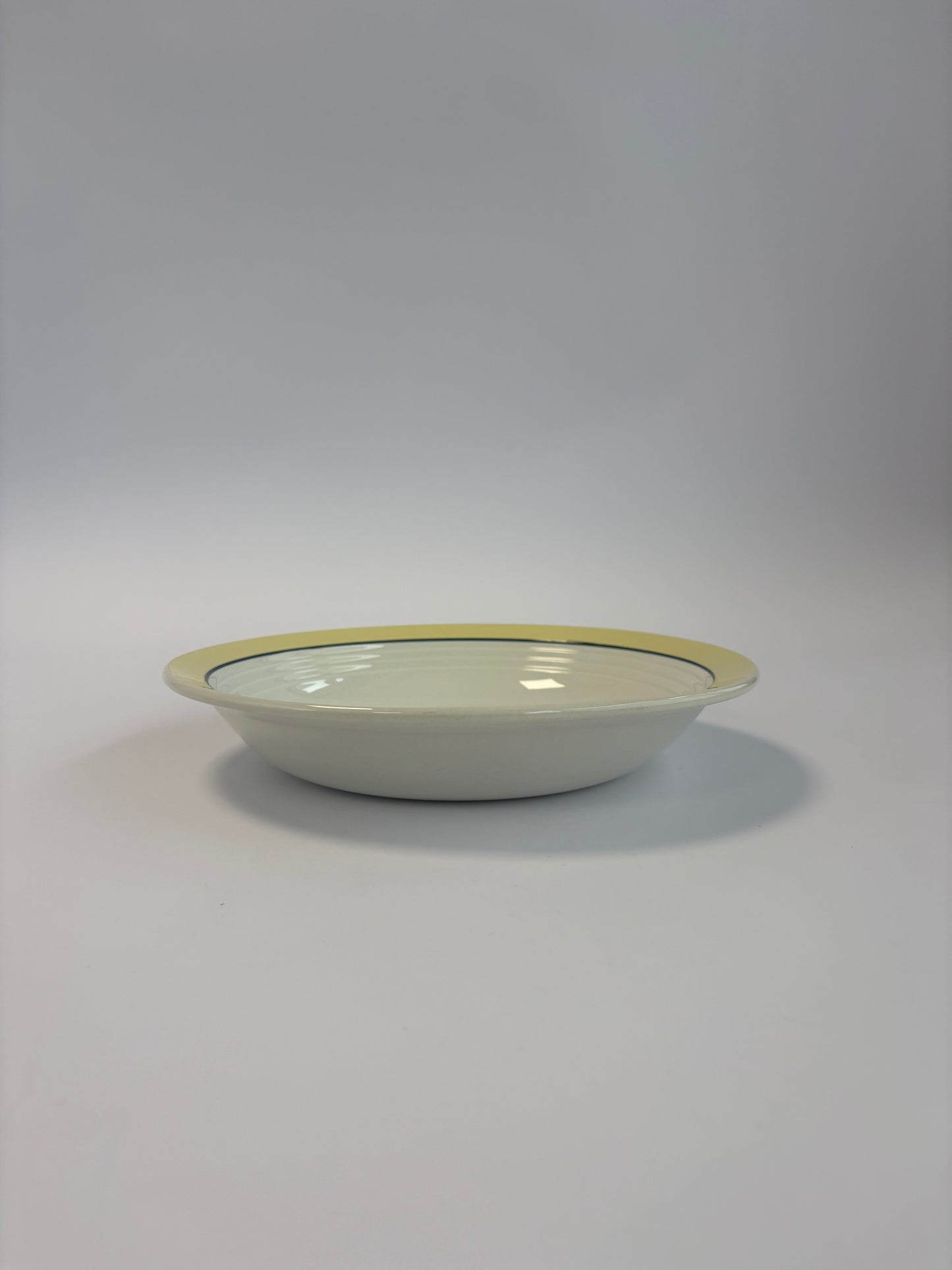Large bowl with yellow and dark rim