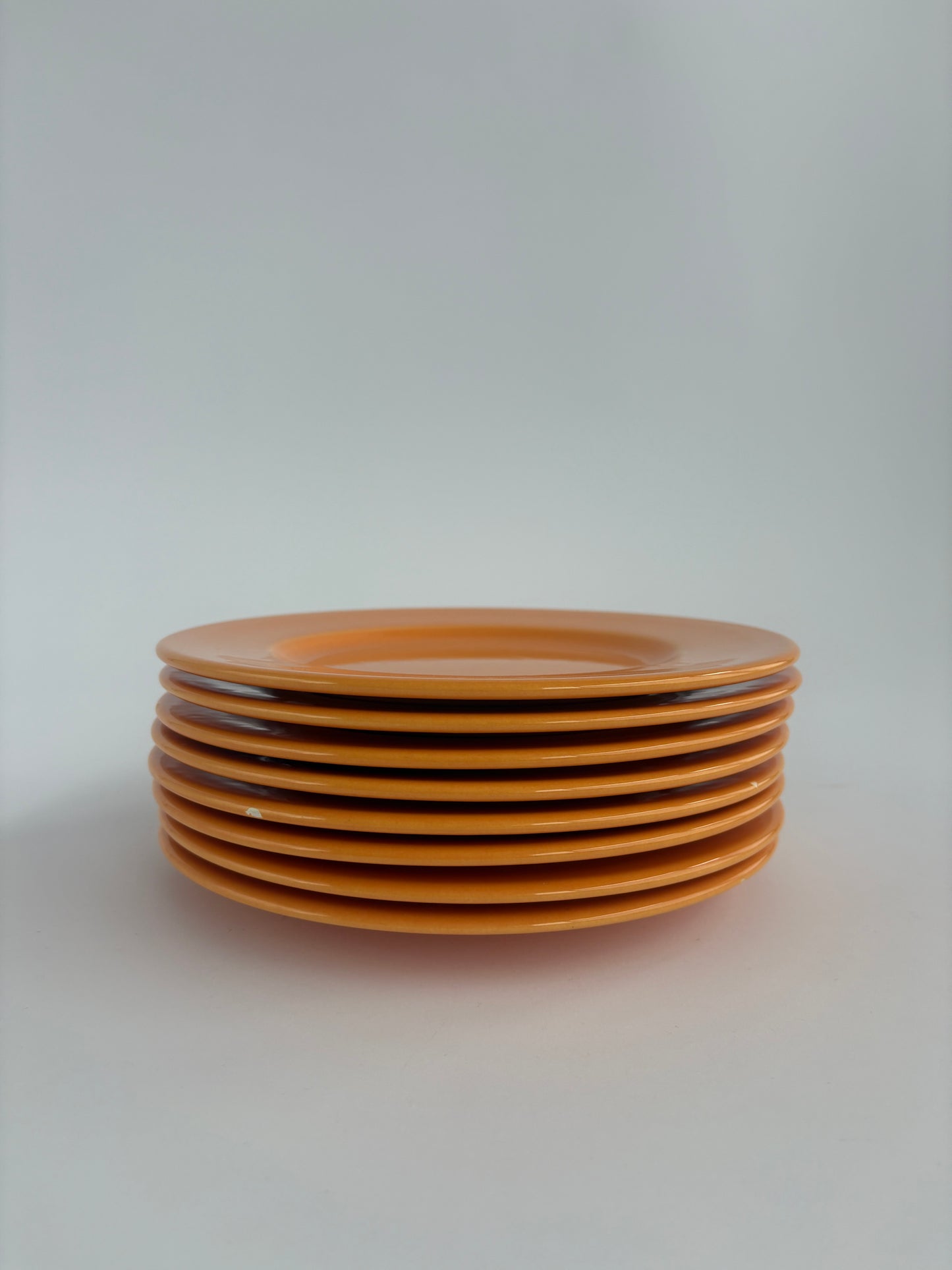 Set of 8 bright orange plates