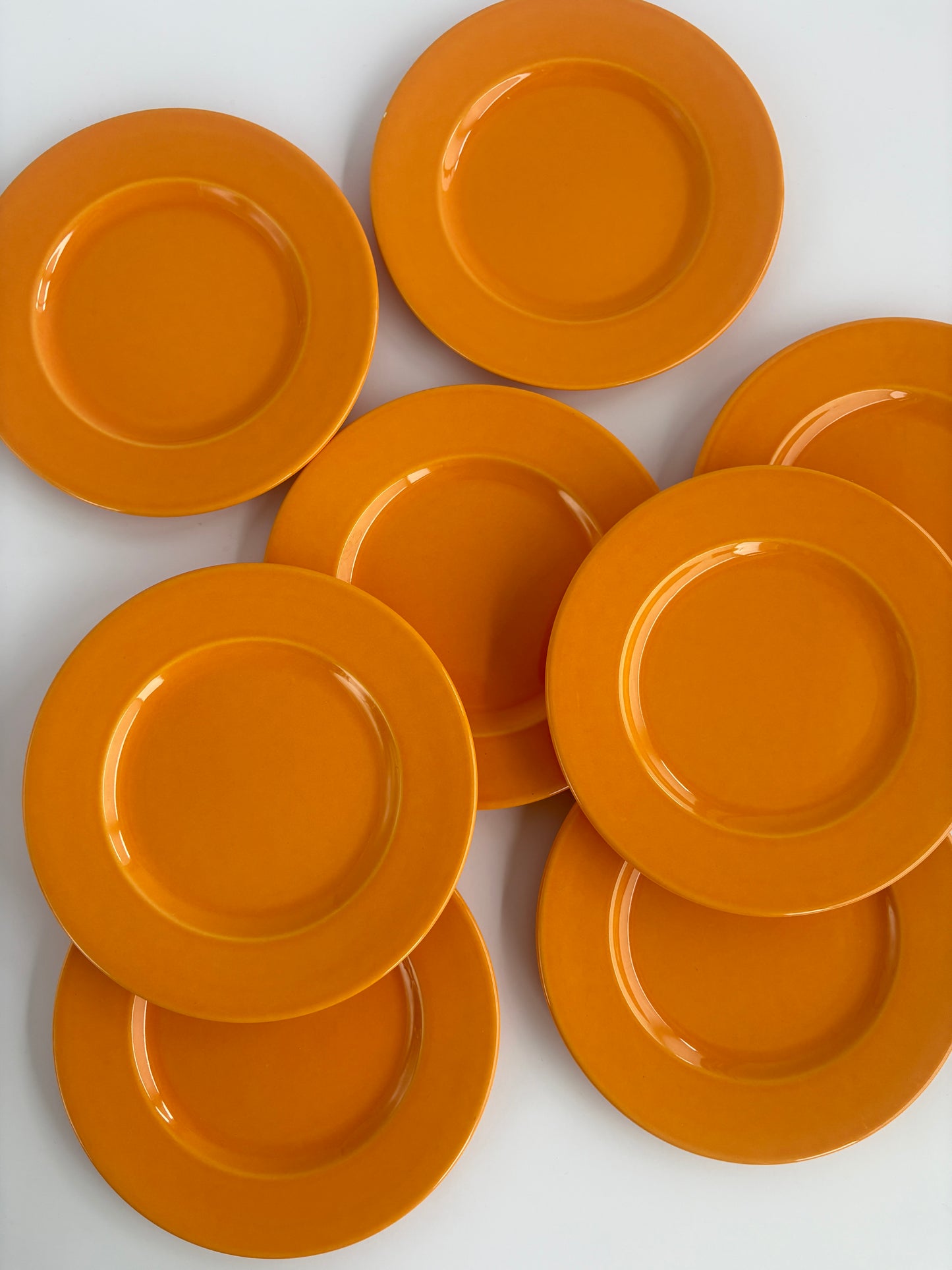 Set of 8 bright orange plates
