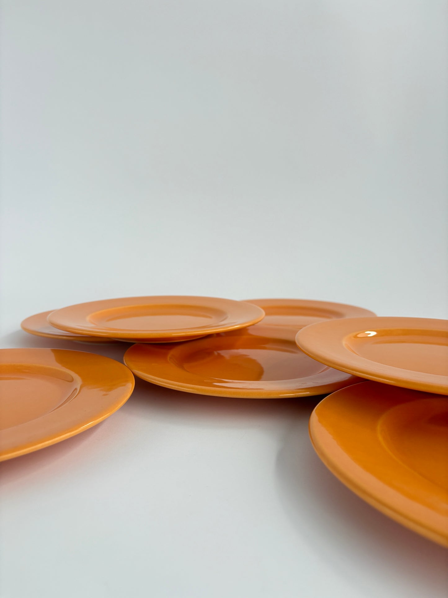 Set of 8 bright orange plates