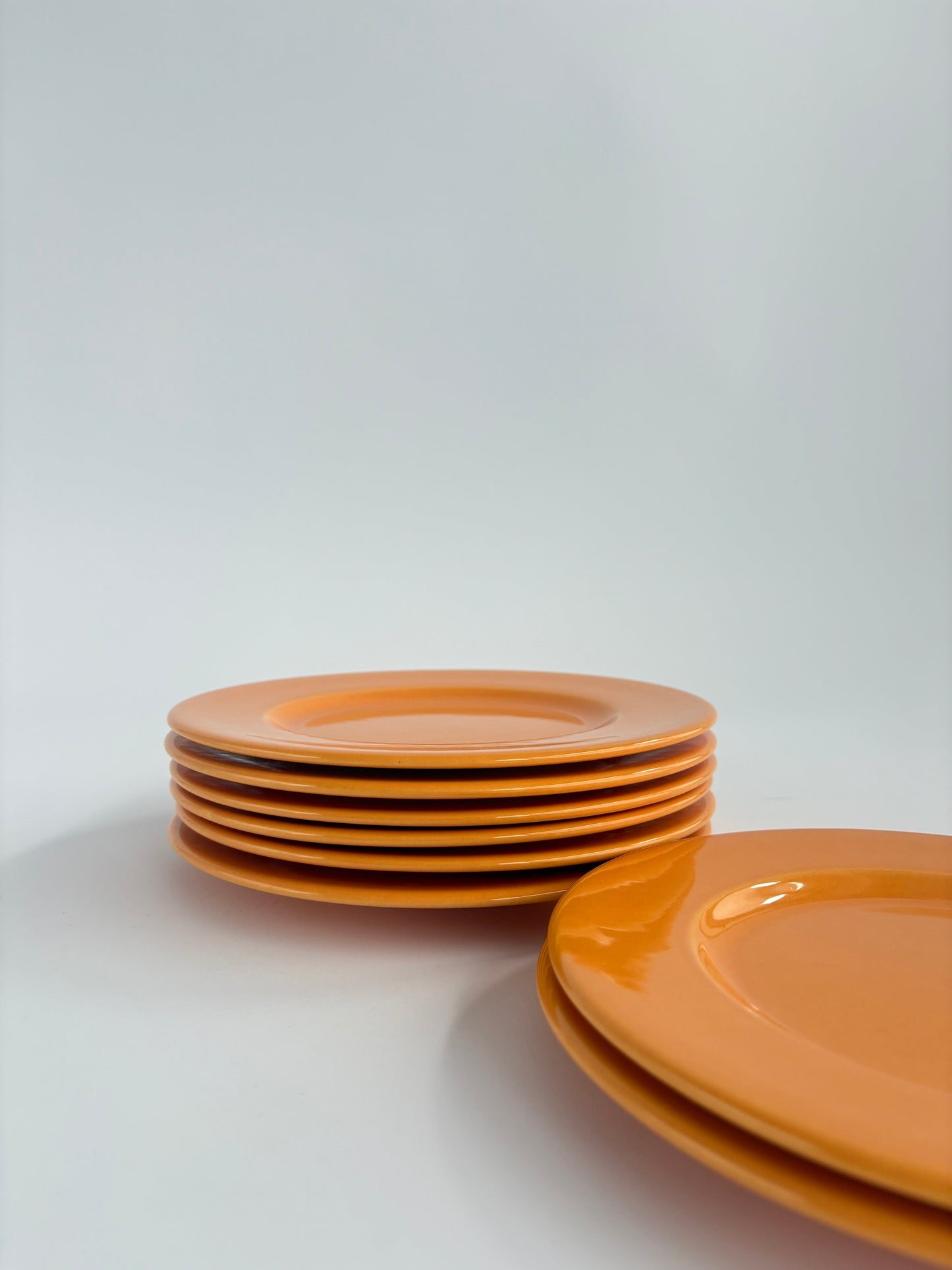 Set of 8 bright orange plates