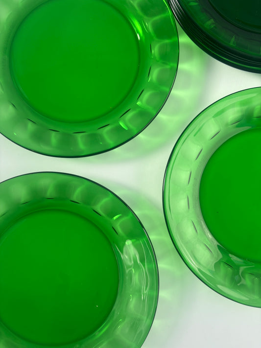 Set of 8 small green glass plates