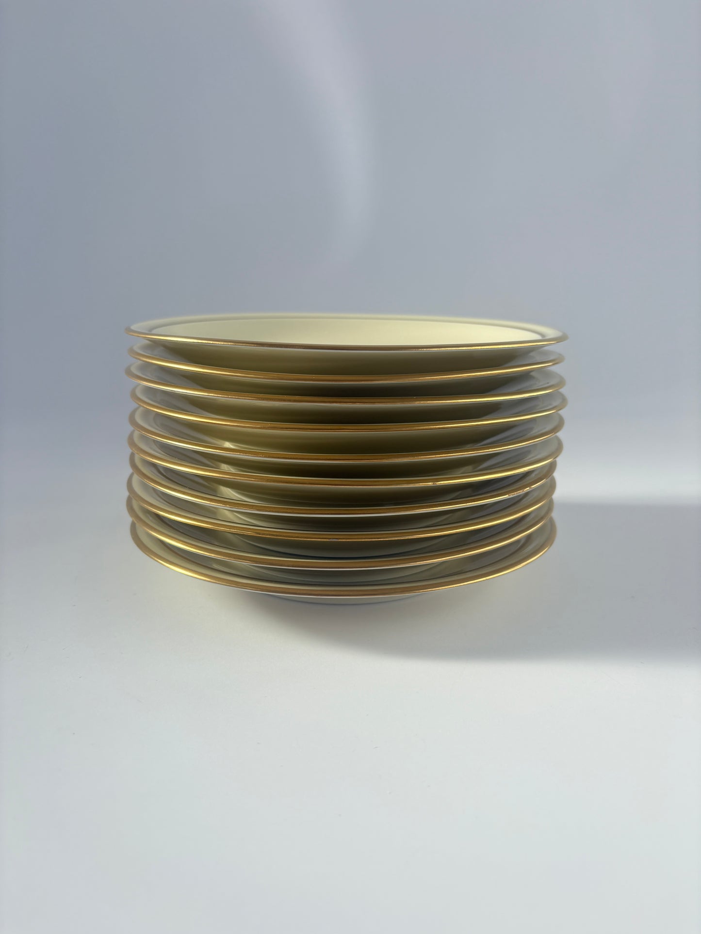 Set of 10 cream plates with double gold rim