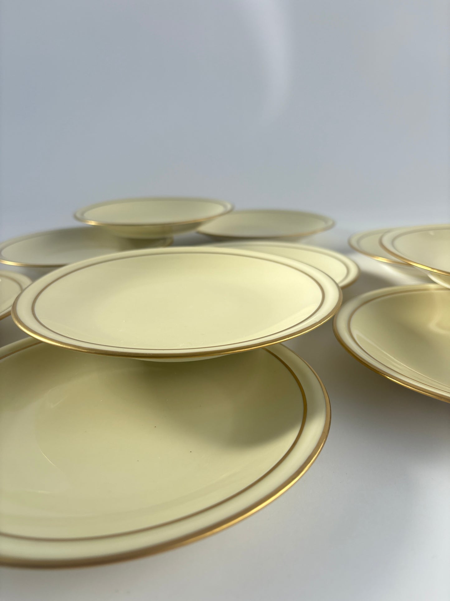 Set of 10 cream plates with double gold rim