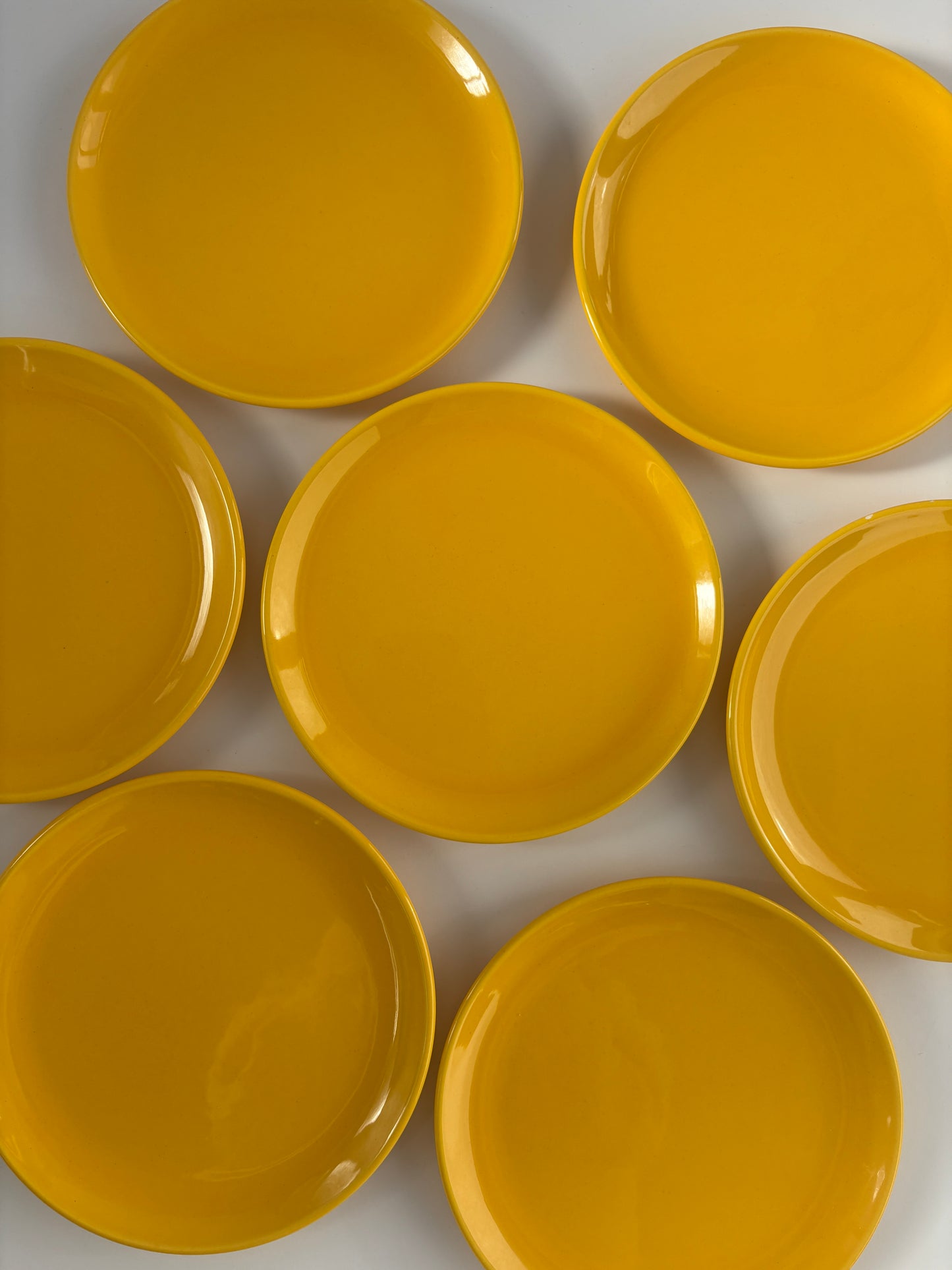 Set of 7 bright yellow plates