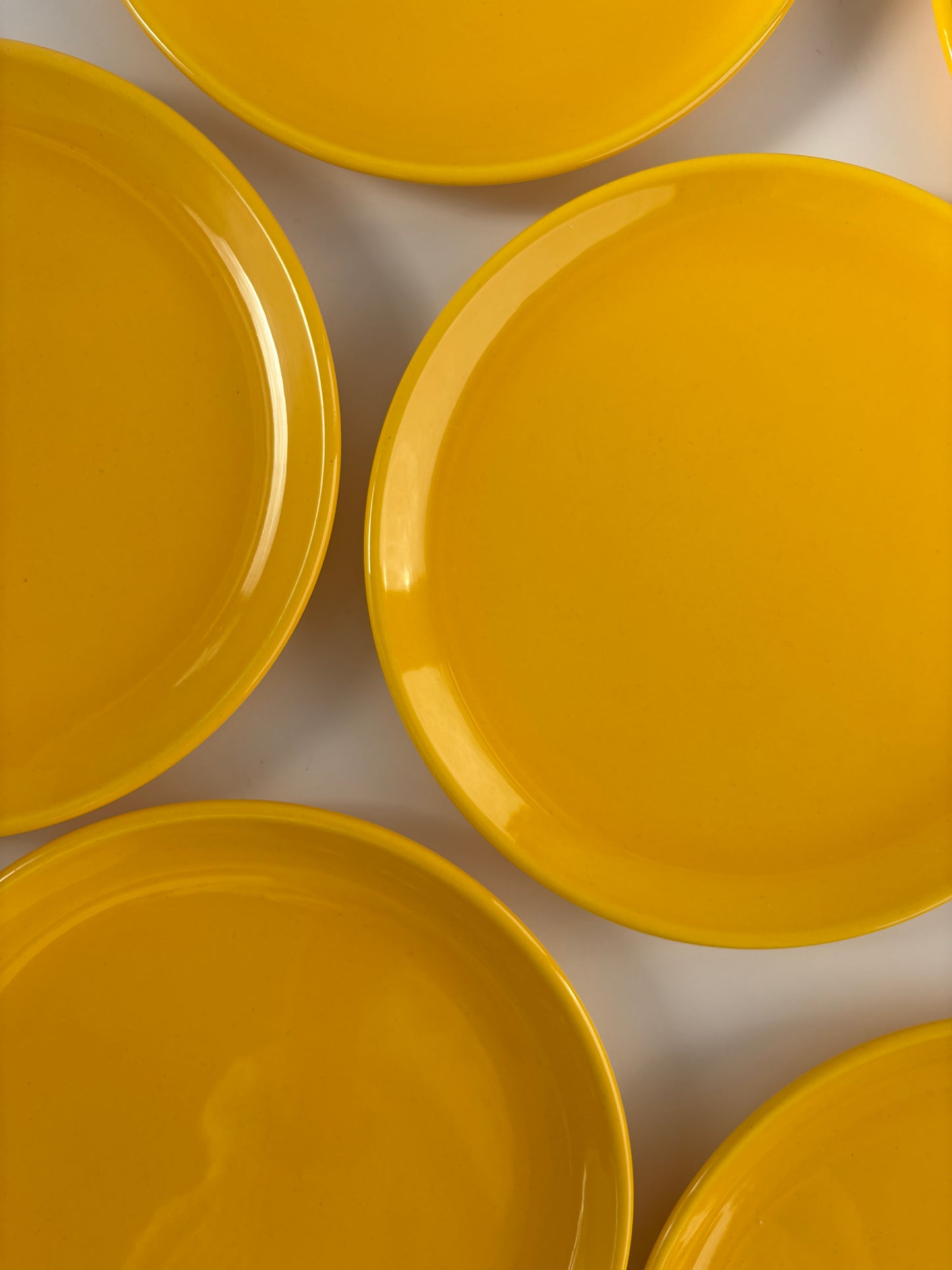 Set of 7 bright yellow plates
