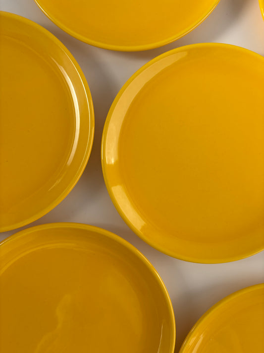 Set of 7 bright yellow plates