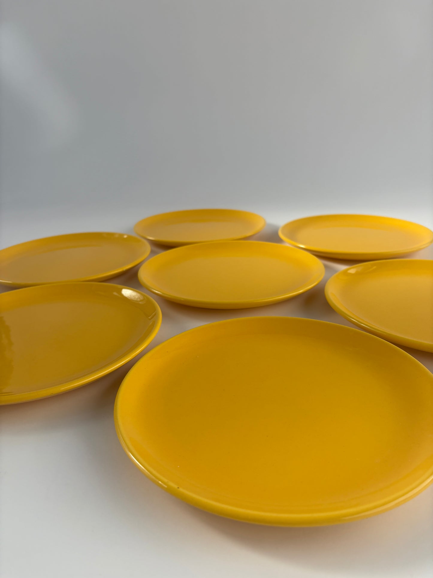 Set of 7 bright yellow plates