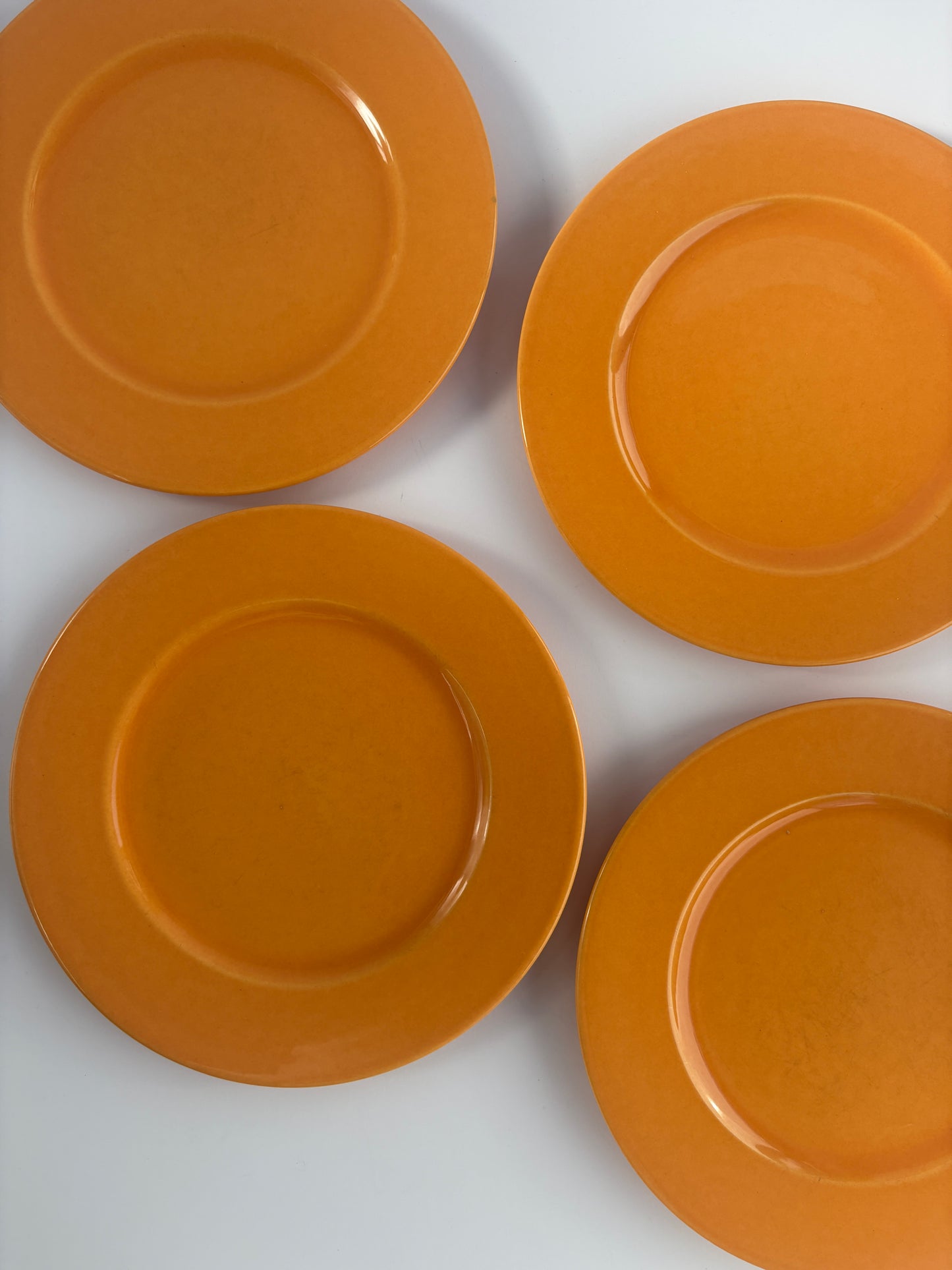 Set of 4 large orange plates