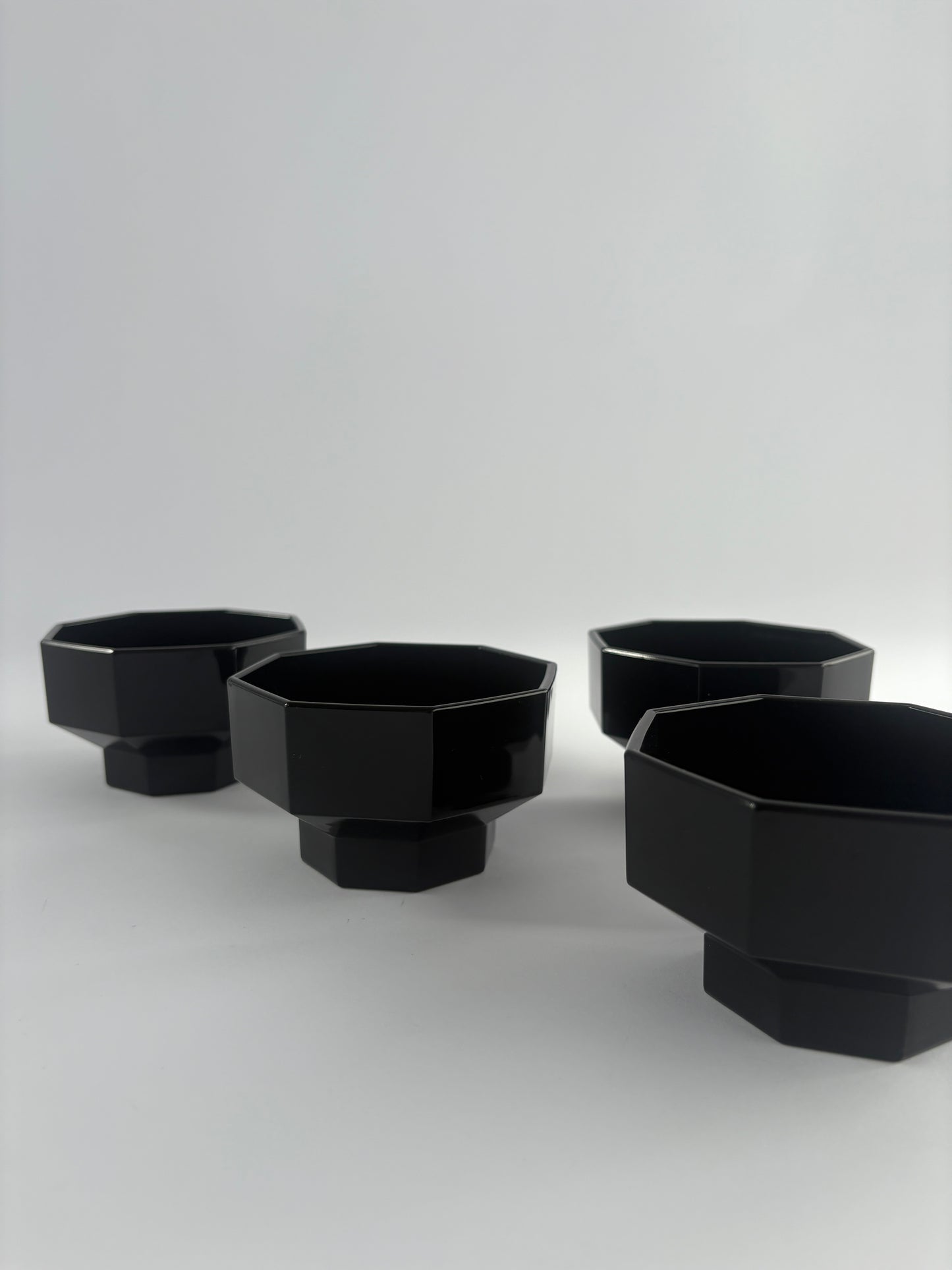 Set of 4 black glass coupes