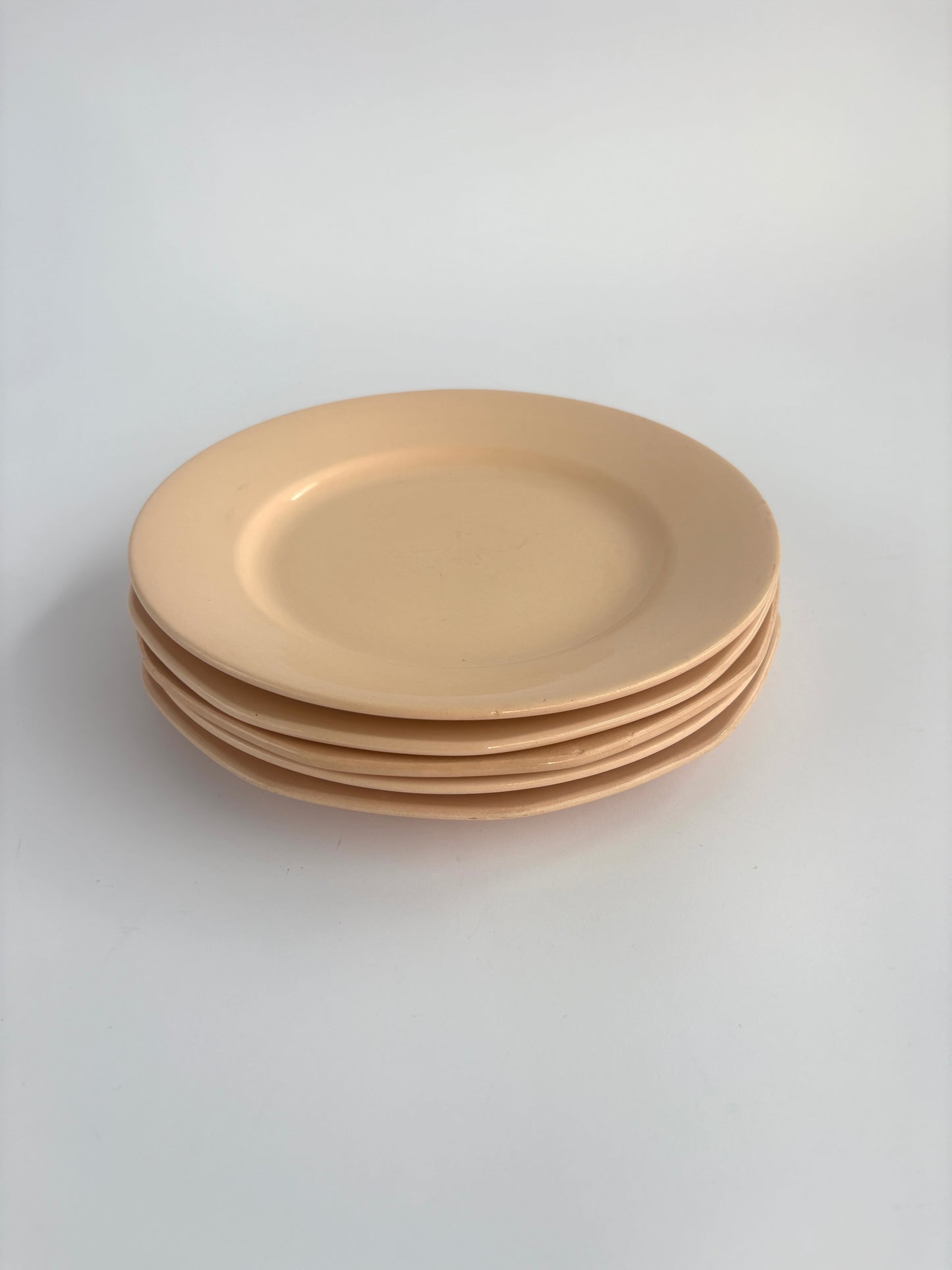 Set of 5 salmon pink plates