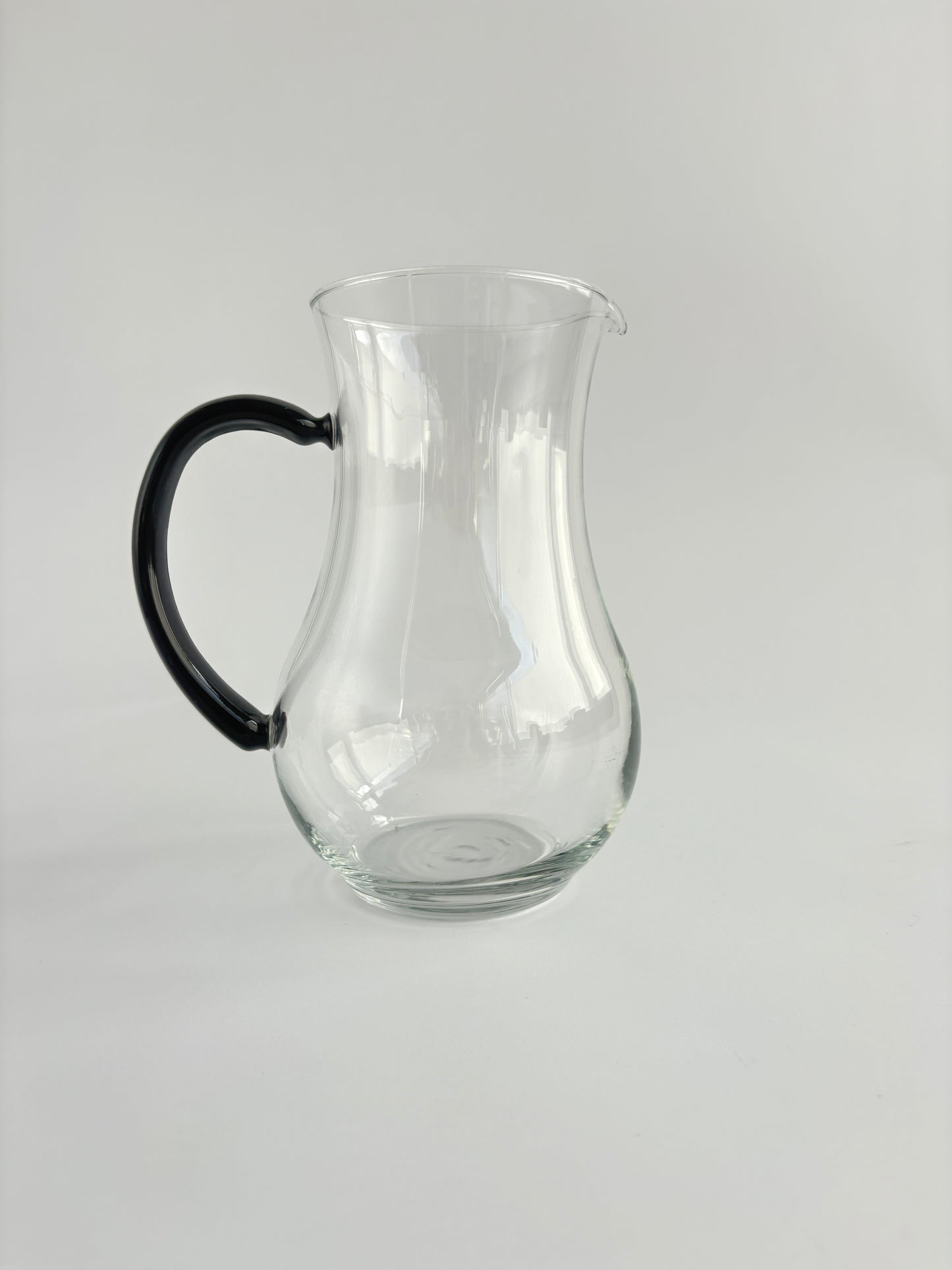 Carafe with black handle
