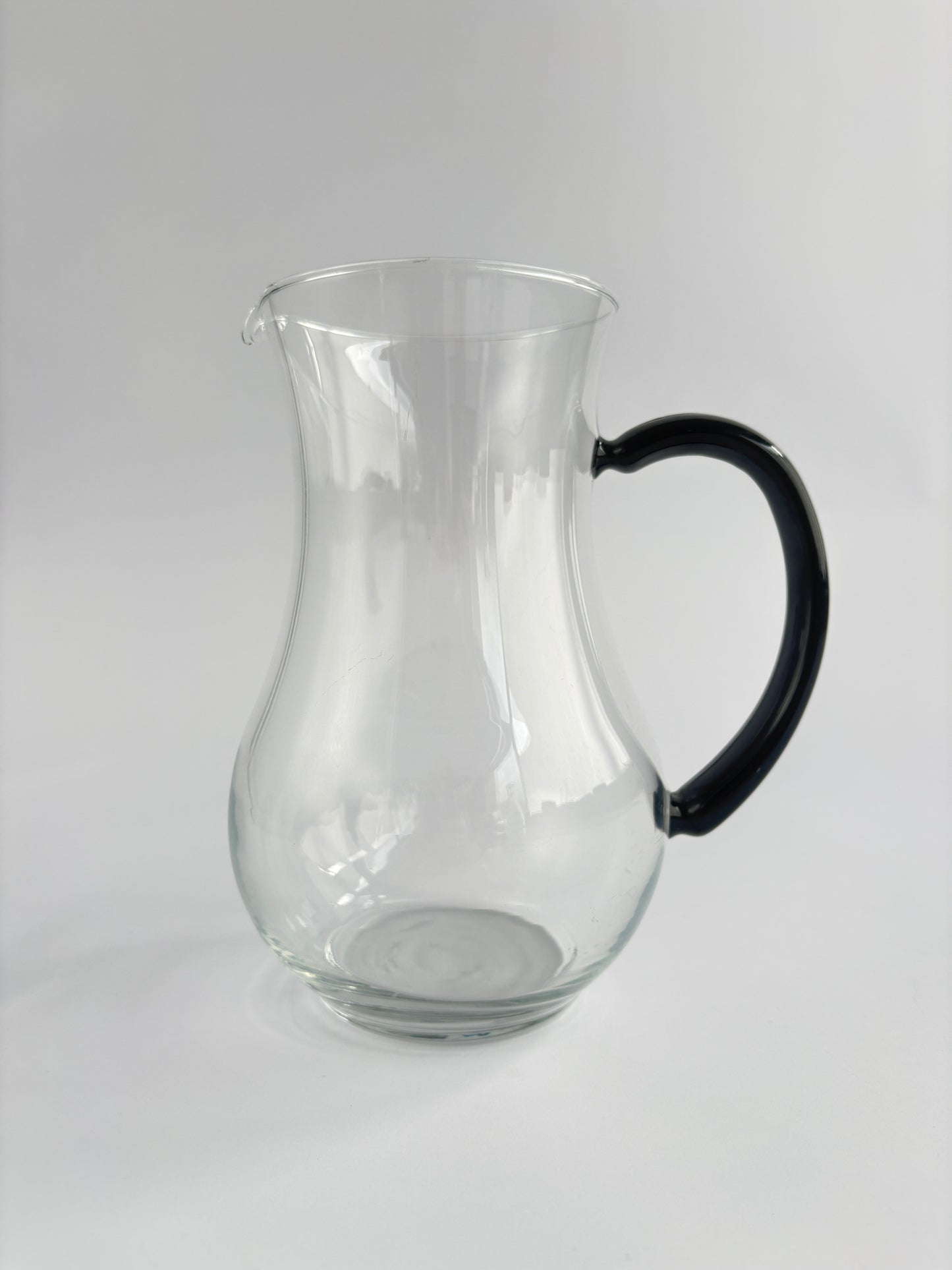 Carafe with black handle