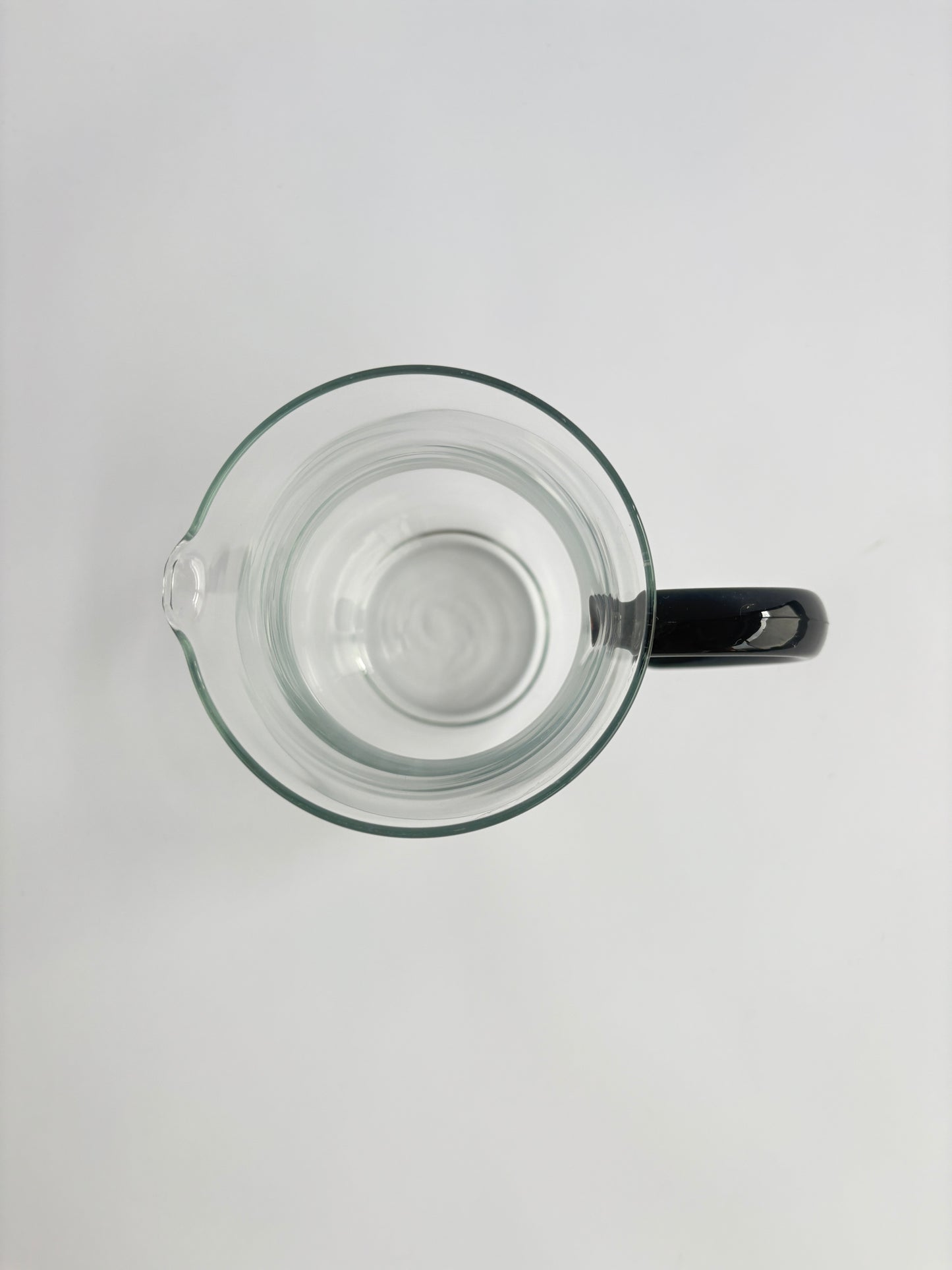 Carafe with black handle